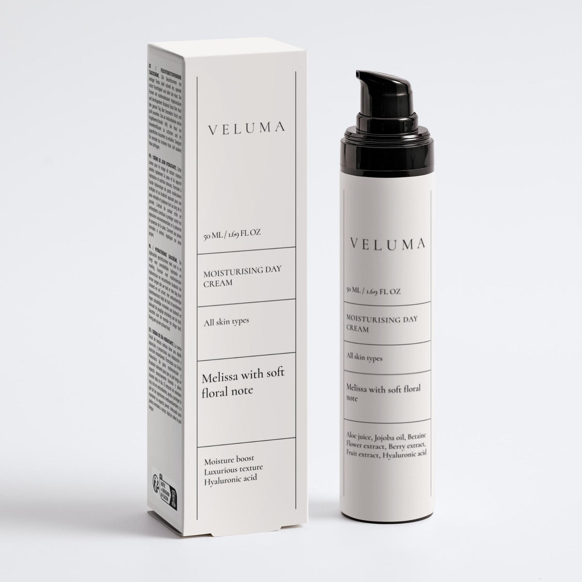 VELUMA Moisturising Day Cream 30ml bottle with a black pump next to its white packaging box, on a clean light gray background.
